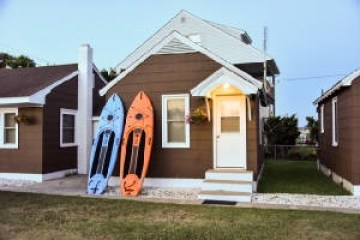 a person standing in front of a house