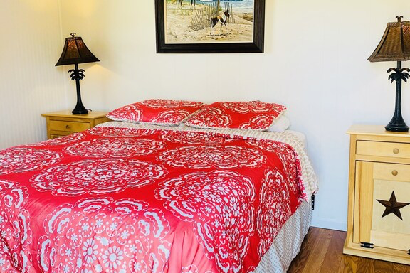 a bedroom with a bed in a room