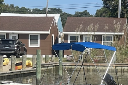a group of people on a boat in the water