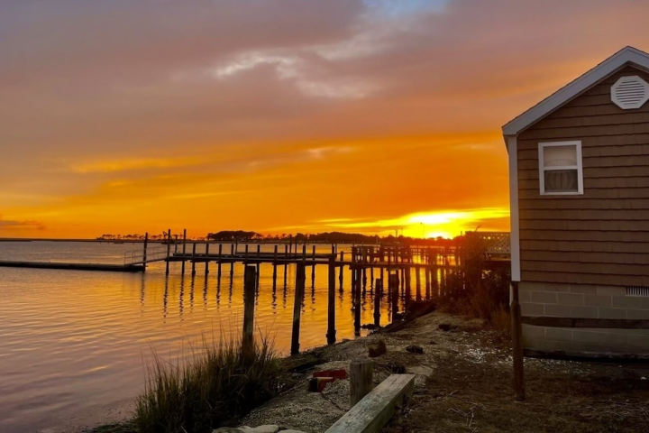 a sunset over a body of water