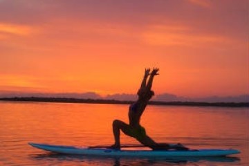 a sunset over a body of water