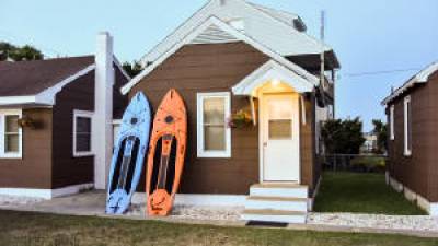 a person standing in front of a house