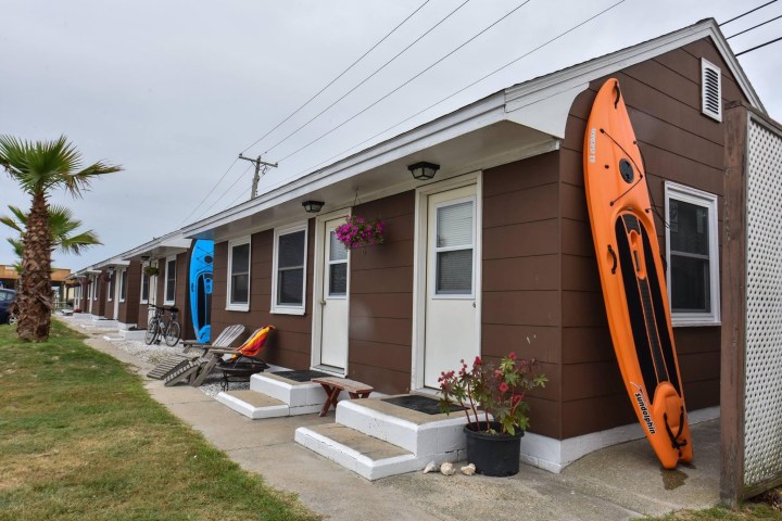 a person standing in front of a house