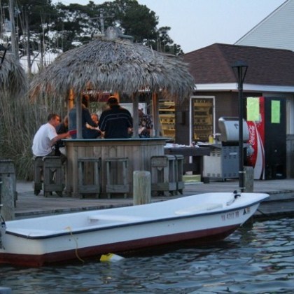 a group of people on a boat in the water